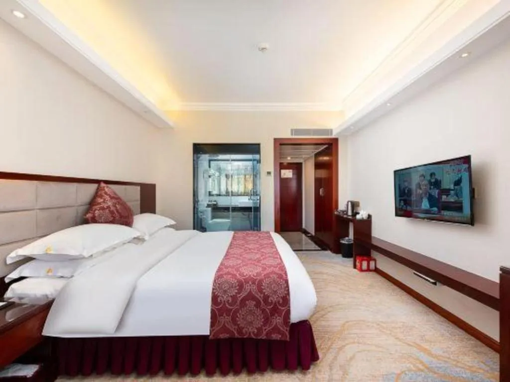 Bed in Overseas Chinese Hotel