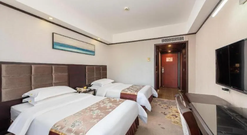 Bed in Overseas Chinese Hotel