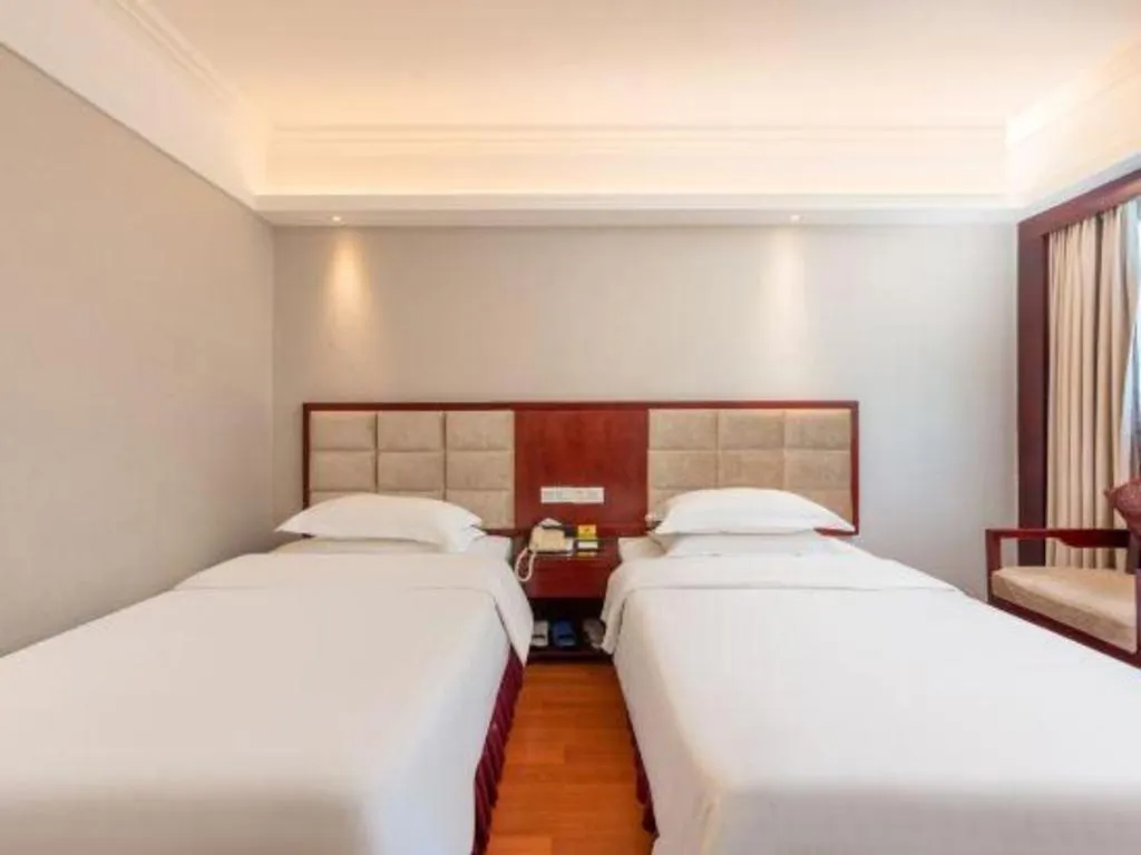 Bed in Overseas Chinese Hotel