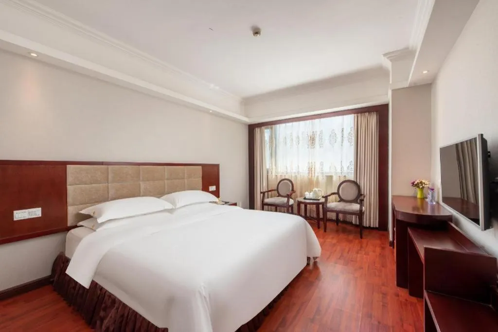 Bed in Overseas Chinese Hotel