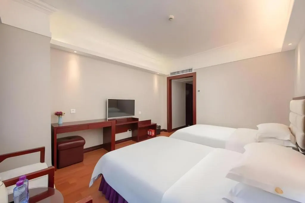 Bed in Overseas Chinese Hotel