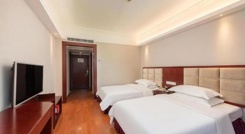 Bed in Overseas Chinese Hotel
