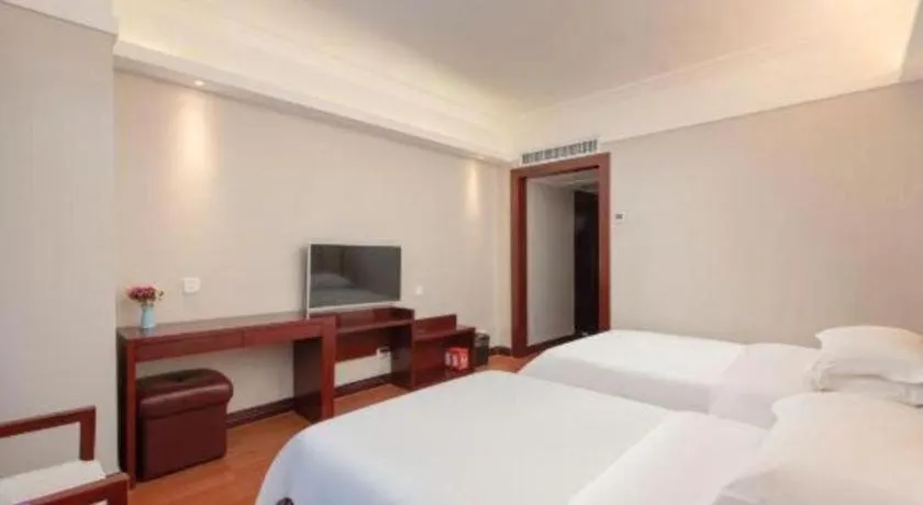 Bed in Overseas Chinese Hotel