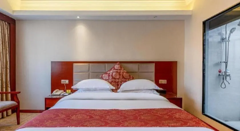 Bed in Overseas Chinese Hotel