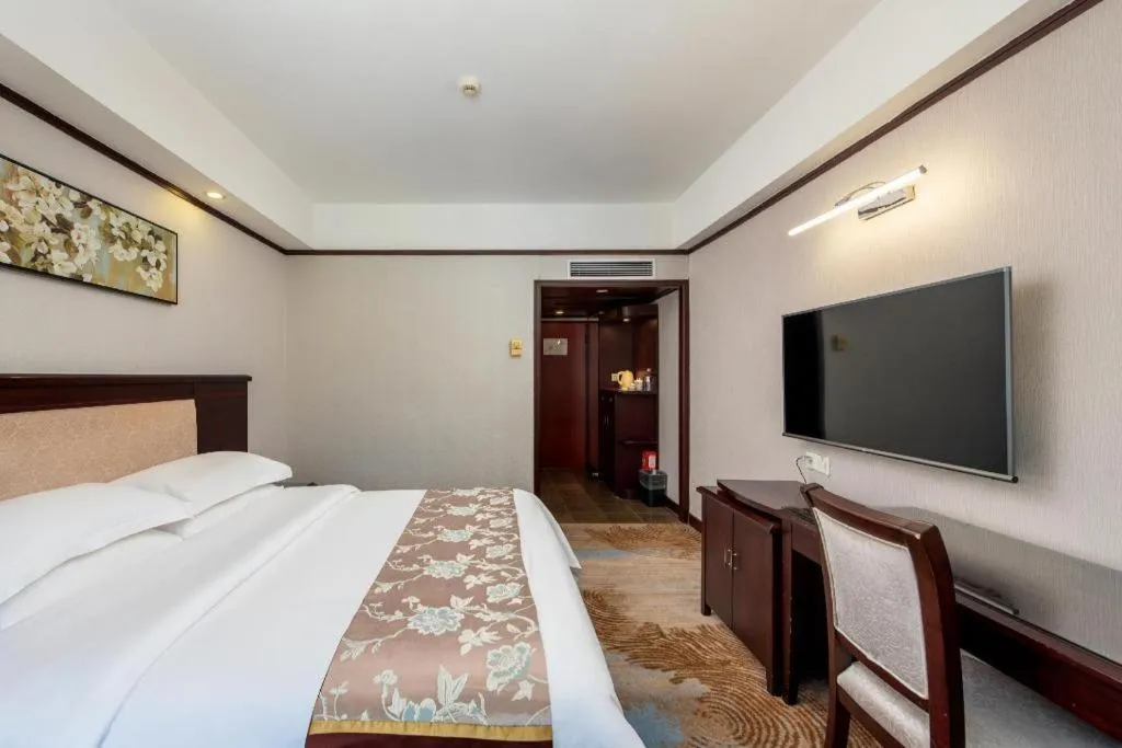 Bed in Overseas Chinese Hotel