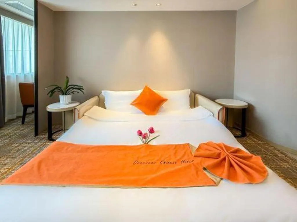 Bed in Overseas Chinese Hotel