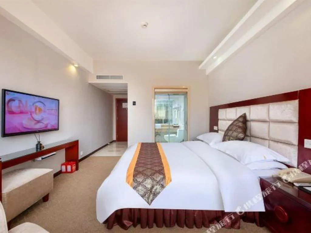 Bed in Overseas Chinese Hotel