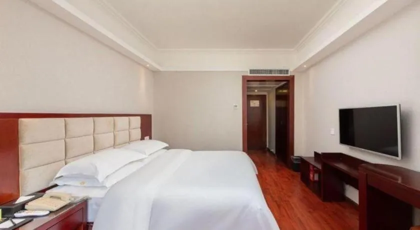 Bed in Overseas Chinese Hotel