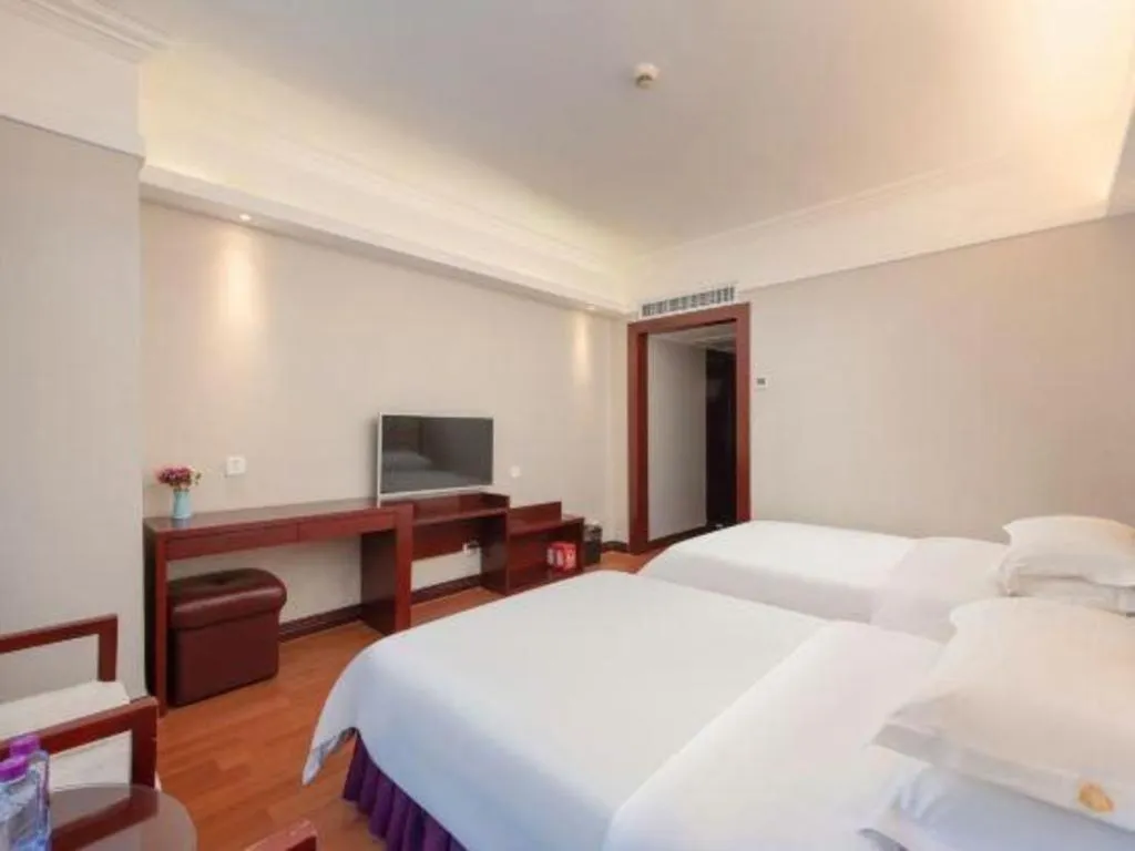 Bed in Overseas Chinese Hotel