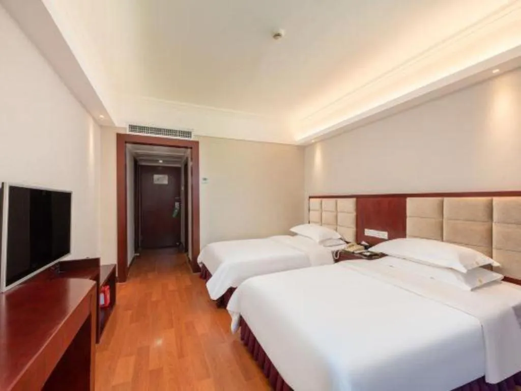 Bed in Overseas Chinese Hotel