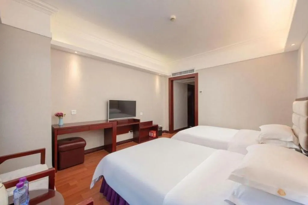 Bed in Overseas Chinese Hotel