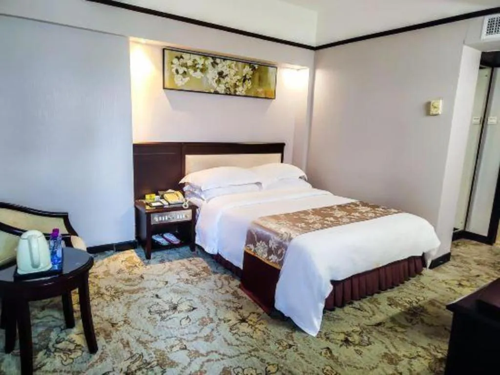 Bed in Overseas Chinese Hotel