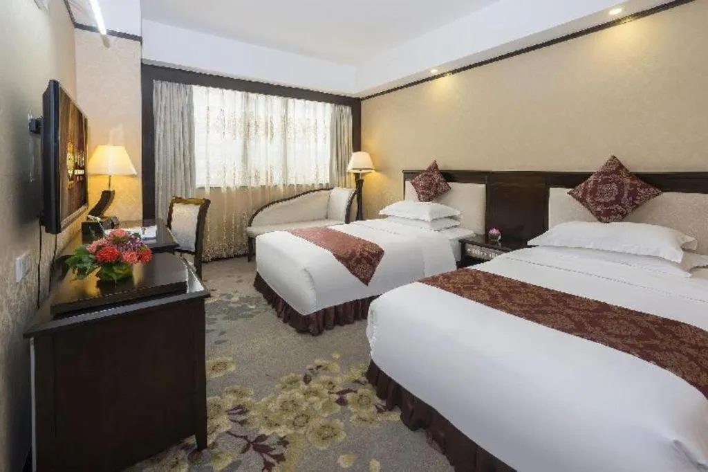 Bed in Overseas Chinese Hotel