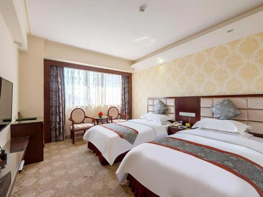 Bed in Overseas Chinese Hotel