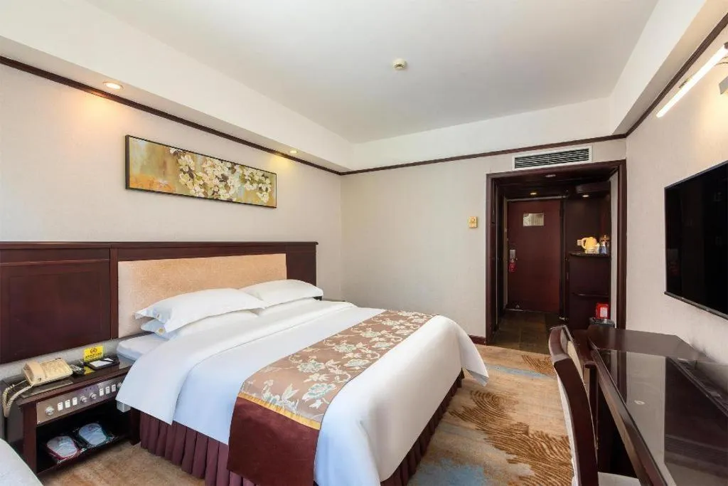 Bed in Overseas Chinese Hotel