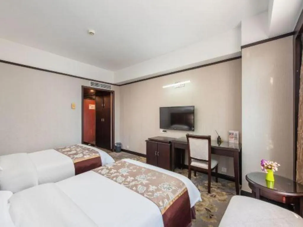 Bed in Overseas Chinese Hotel