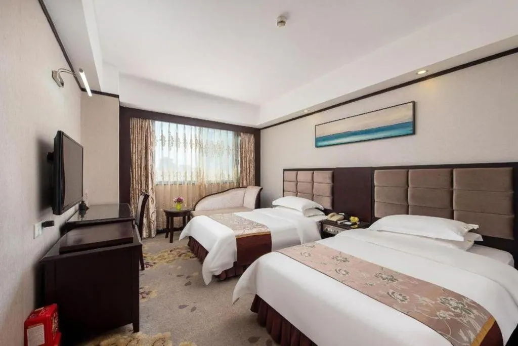 Bed in Overseas Chinese Hotel