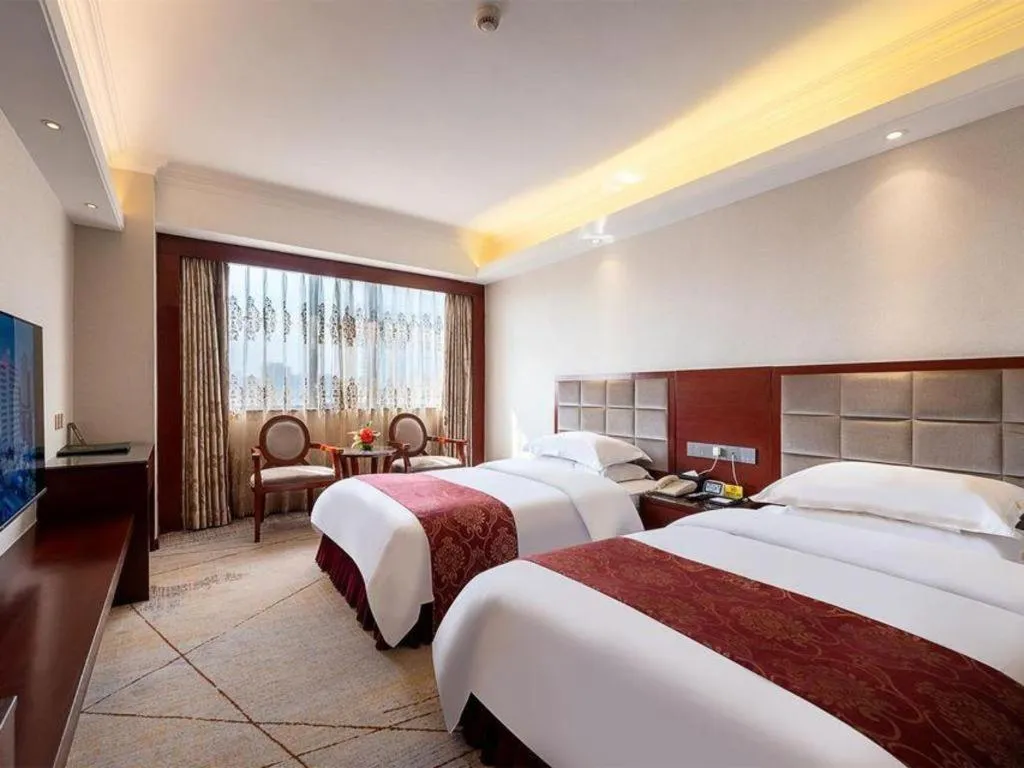 Bed in Overseas Chinese Hotel