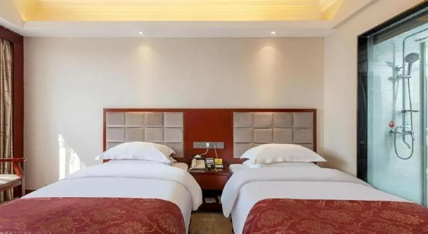 Bed in Overseas Chinese Hotel