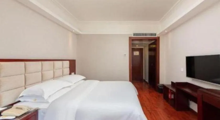 Bed in Overseas Chinese Hotel