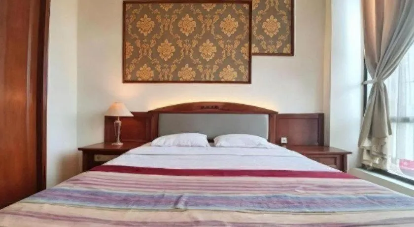 Bed in Larisae Setia Kawan Hotel