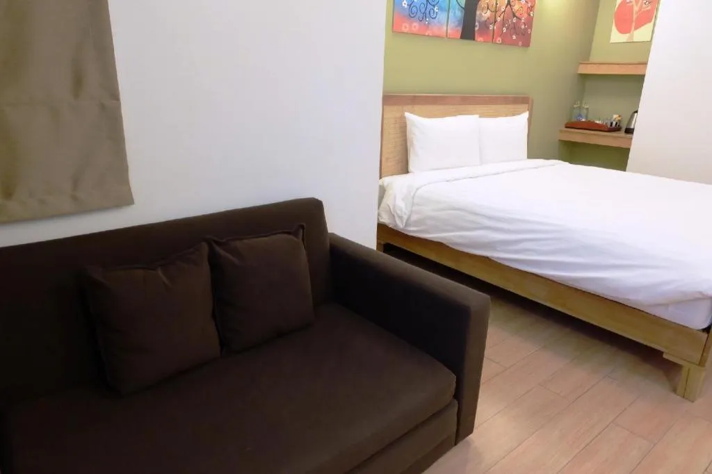 Bed in Cozy At 9 Hotel And Kitchen