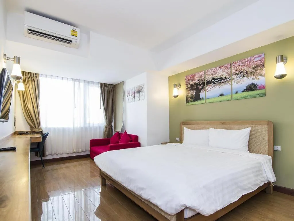 Bed in Cozy At 9 Hotel And Kitchen