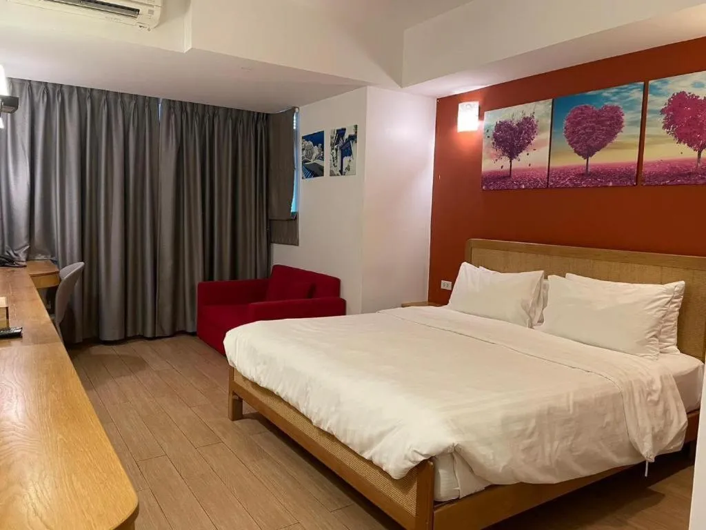 Bed in Cozy At 9 Hotel And Kitchen