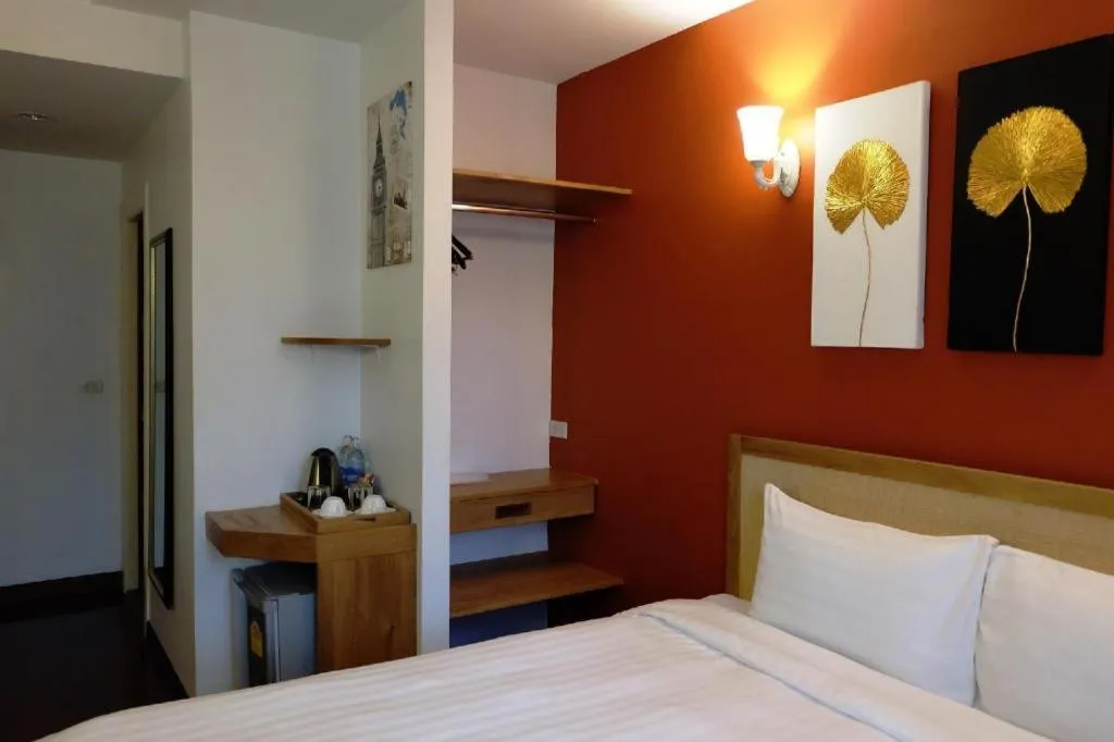 Bed in Cozy At 9 Hotel And Kitchen