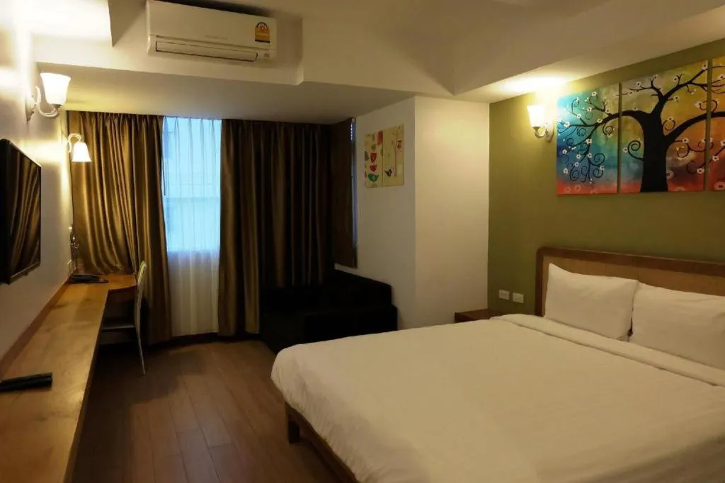 Bed in Cozy At 9 Hotel And Kitchen