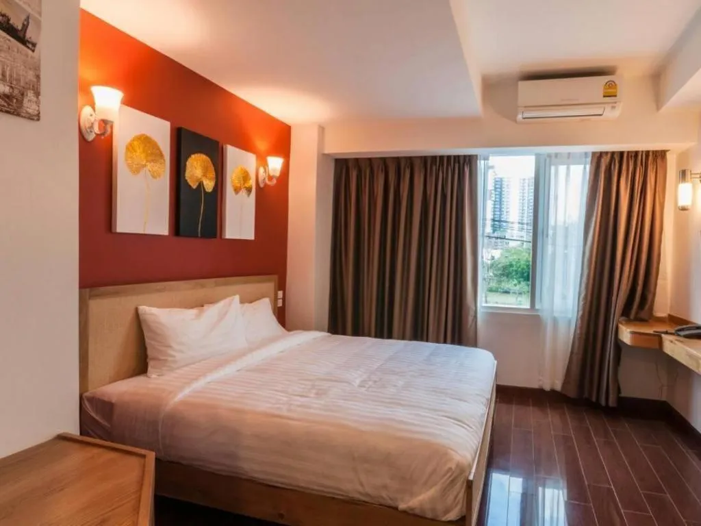 Bed in Cozy At 9 Hotel And Kitchen