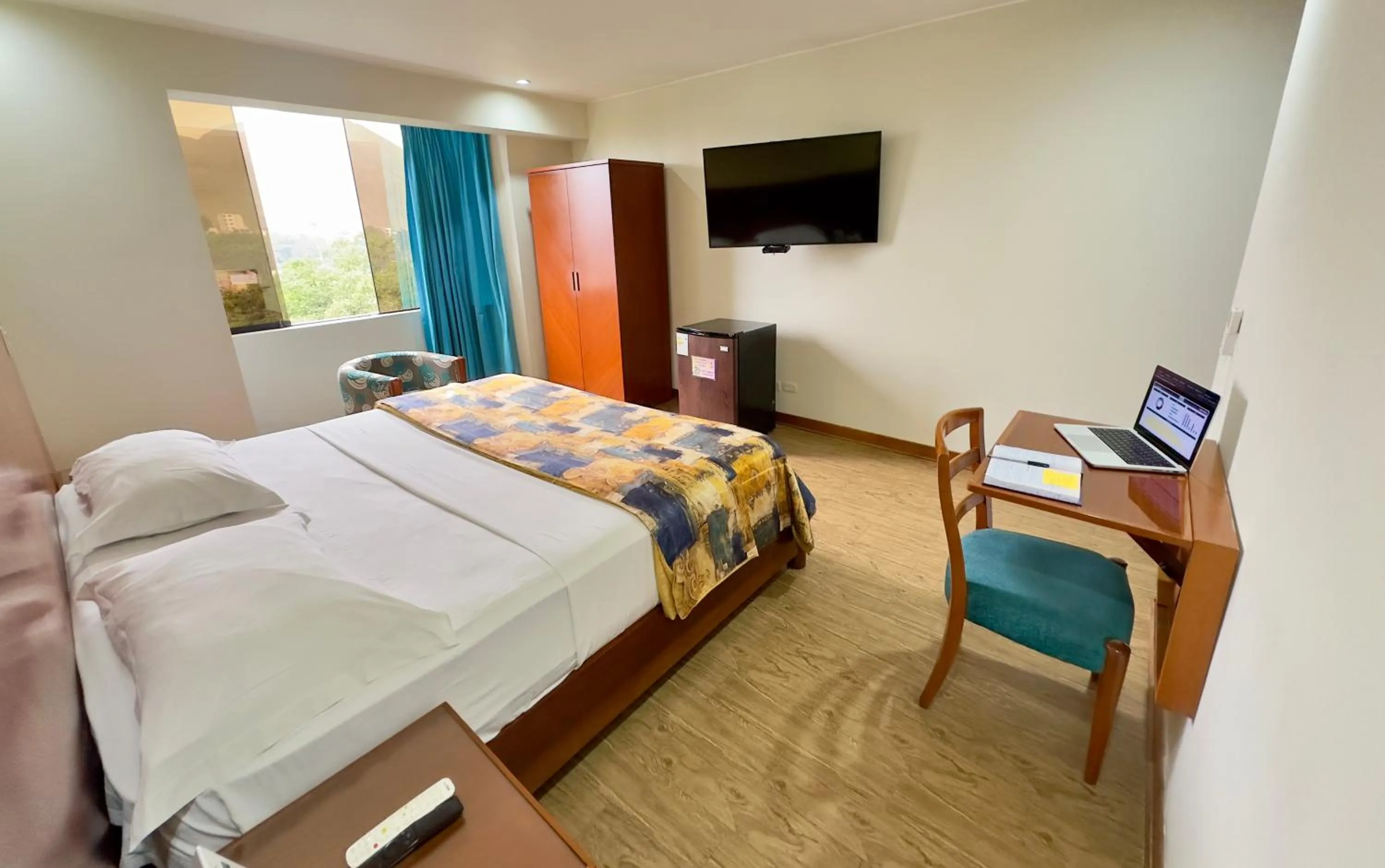 Bed in Hotel Esencia Suites