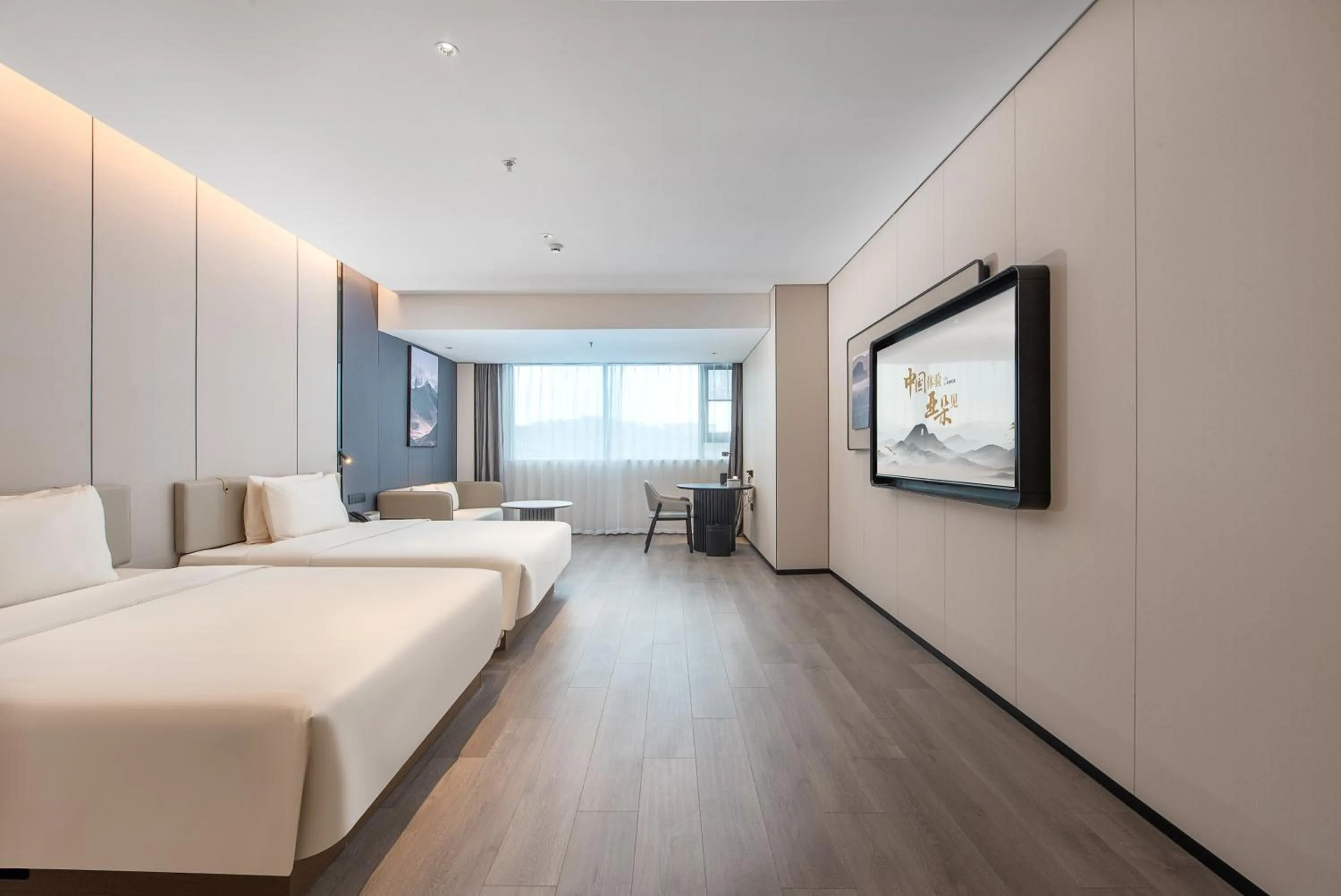 Bed in Atour Hotel Shenzhen Pingshan Kengzi Metro Station