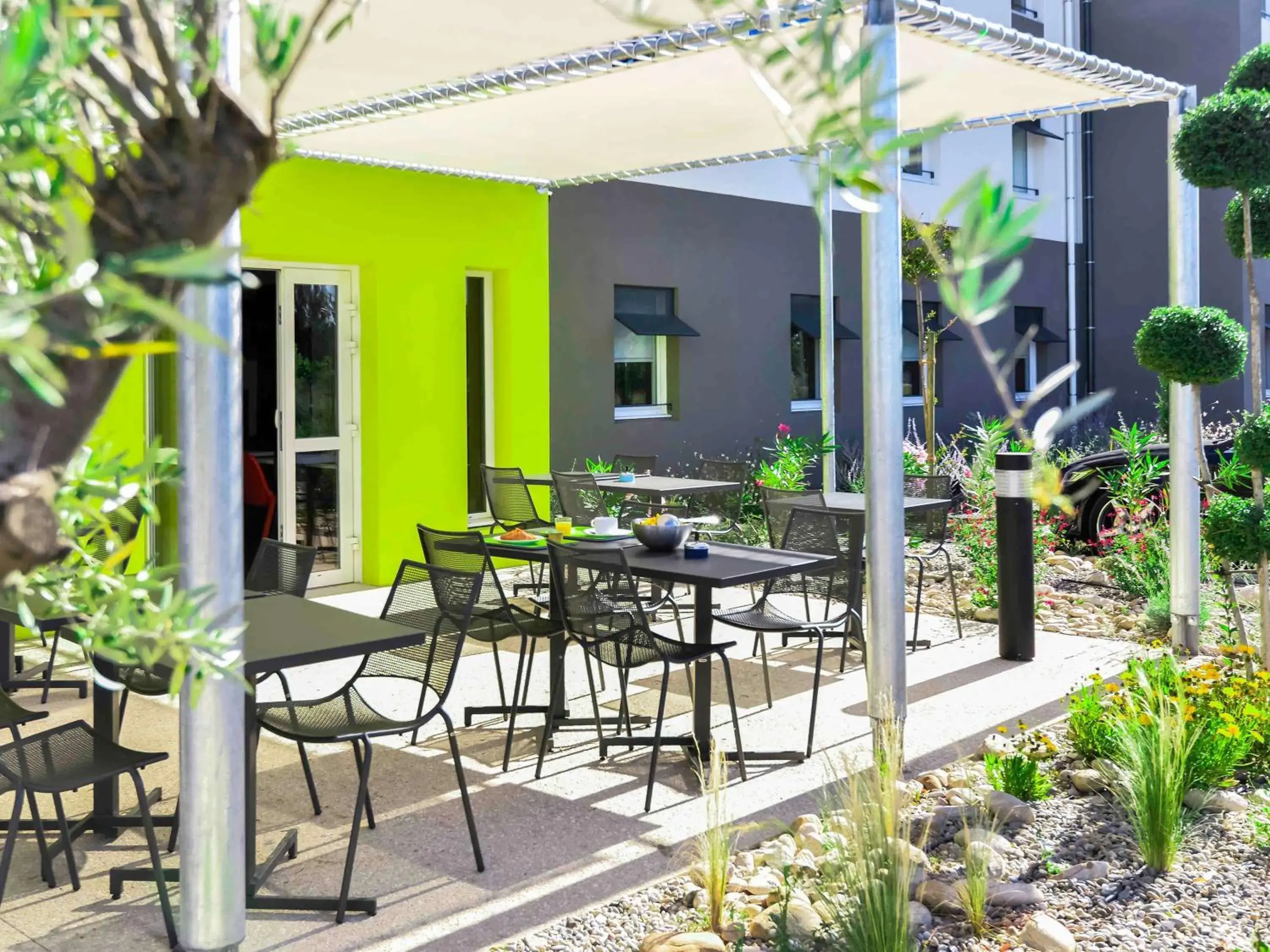 Property building in Ibis Budget Porte de Camargue Property building in Ibis Budget Porte de Camargue