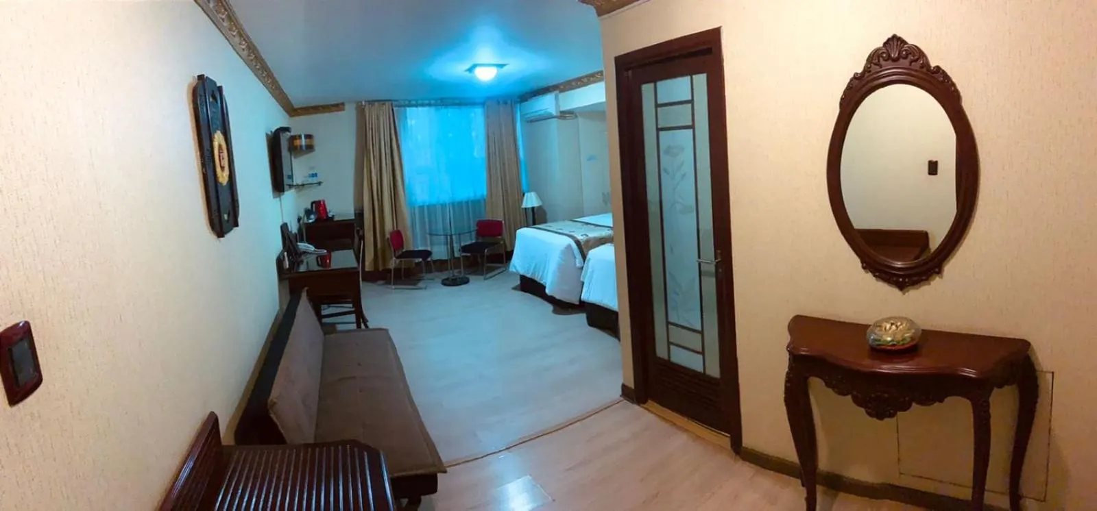 Bed in Hotel Oro Inn