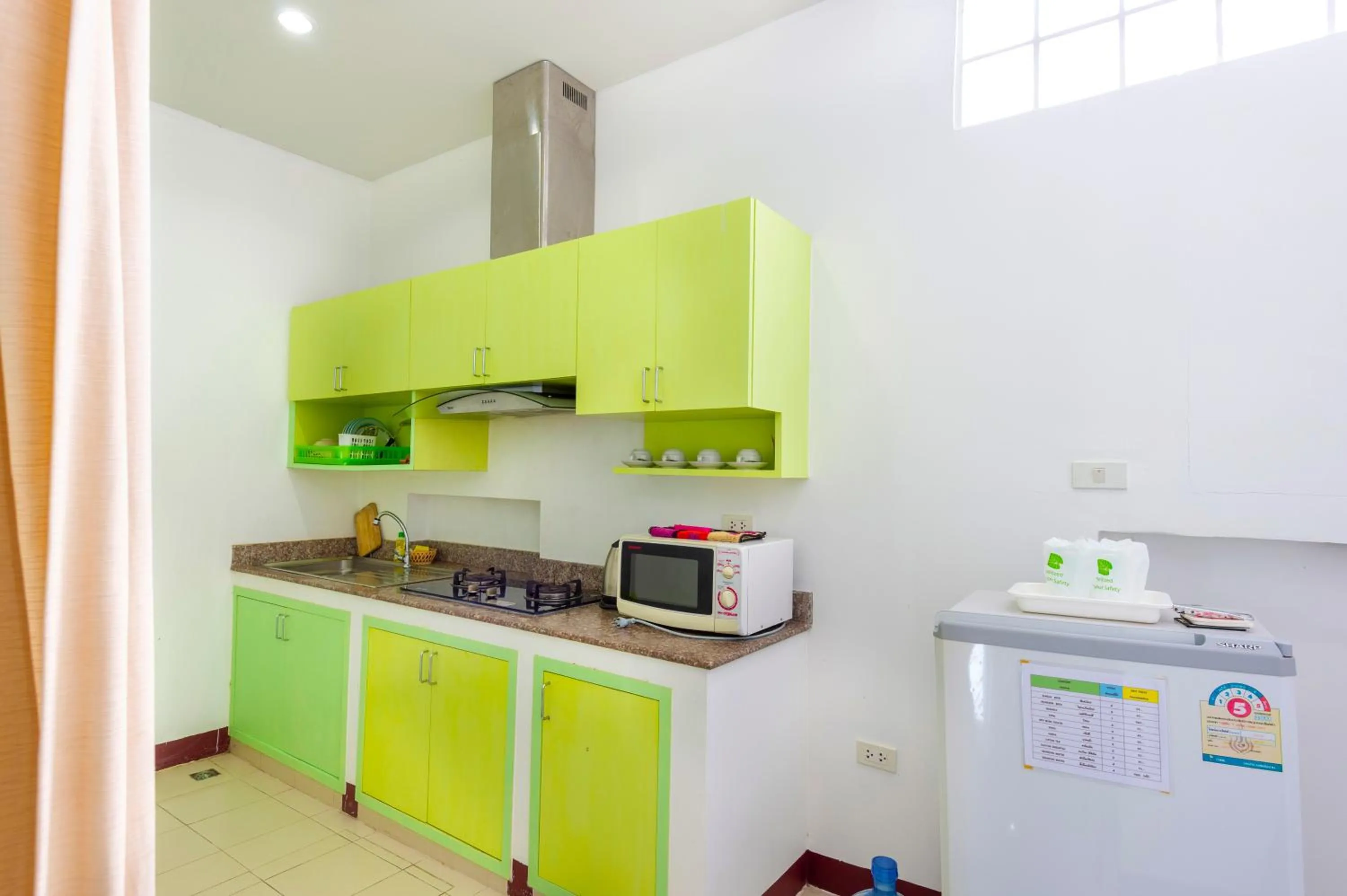 Communal kitchen in Baan Noppadol Hua Hin Resort