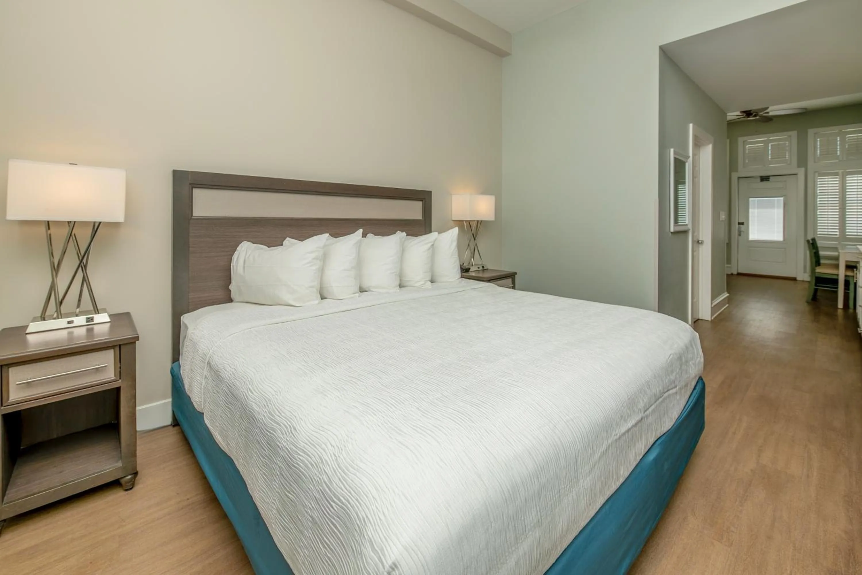 Bed in Commander Hotel & Suites