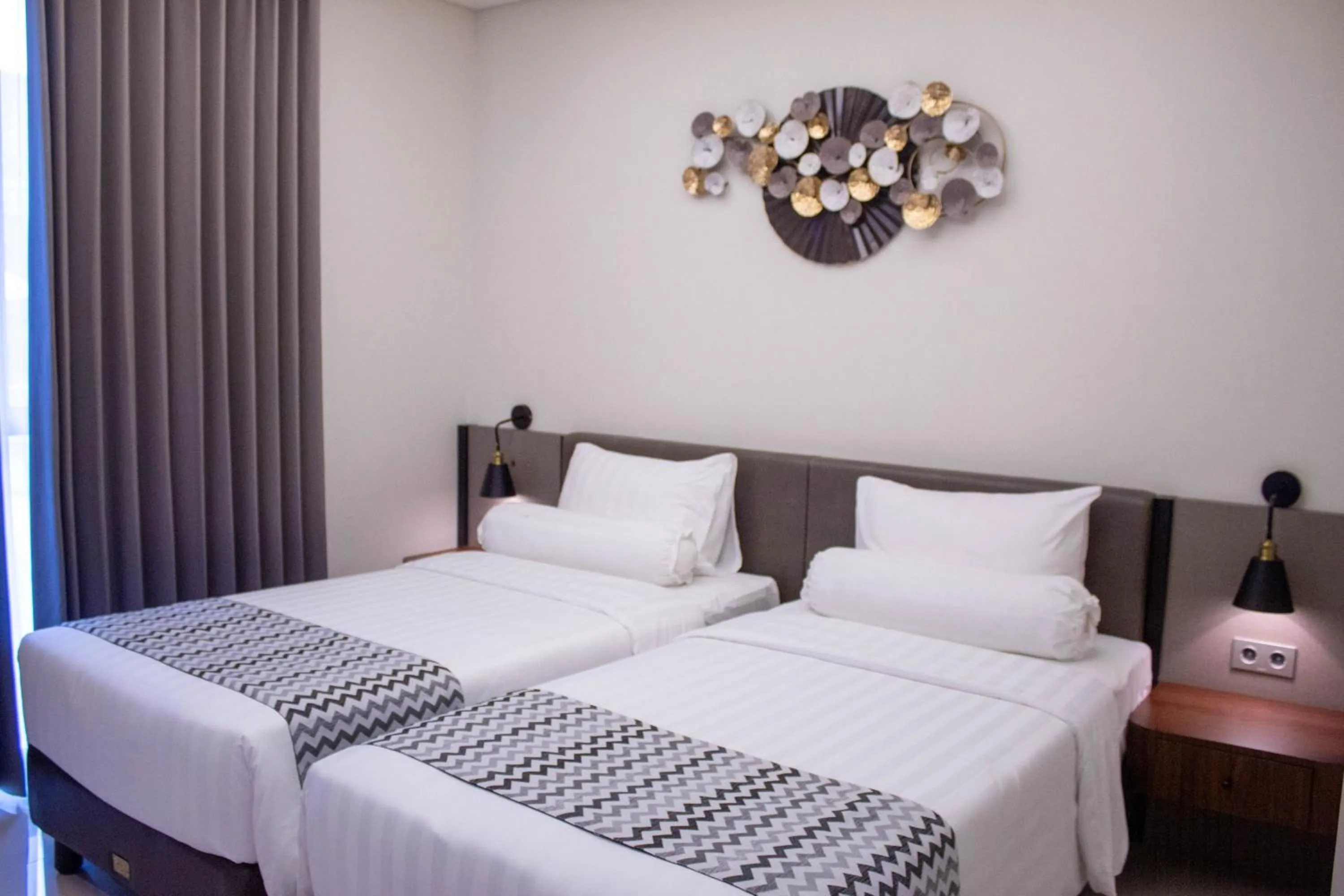 Bed in Azana Garden Hill Resort Blora