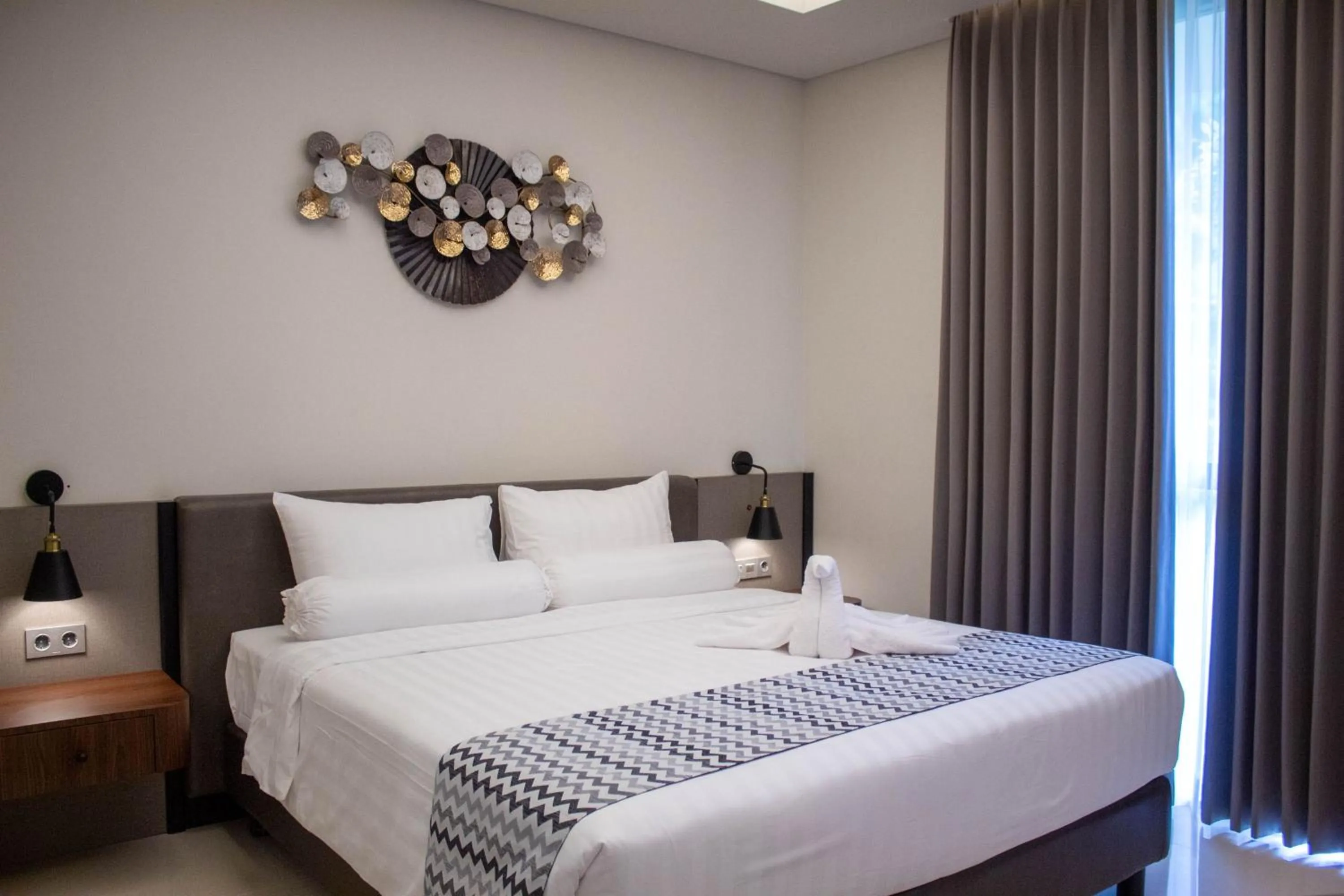 Bed in Azana Garden Hill Resort Blora