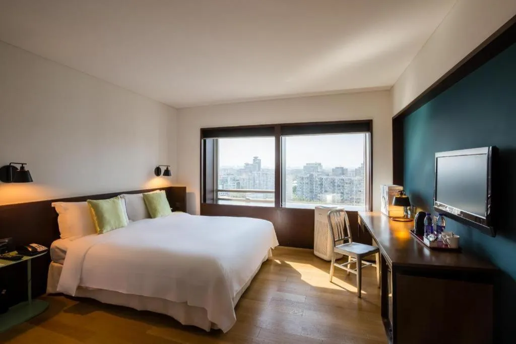 Bed in Beijing New World Center Tongpai Hotel