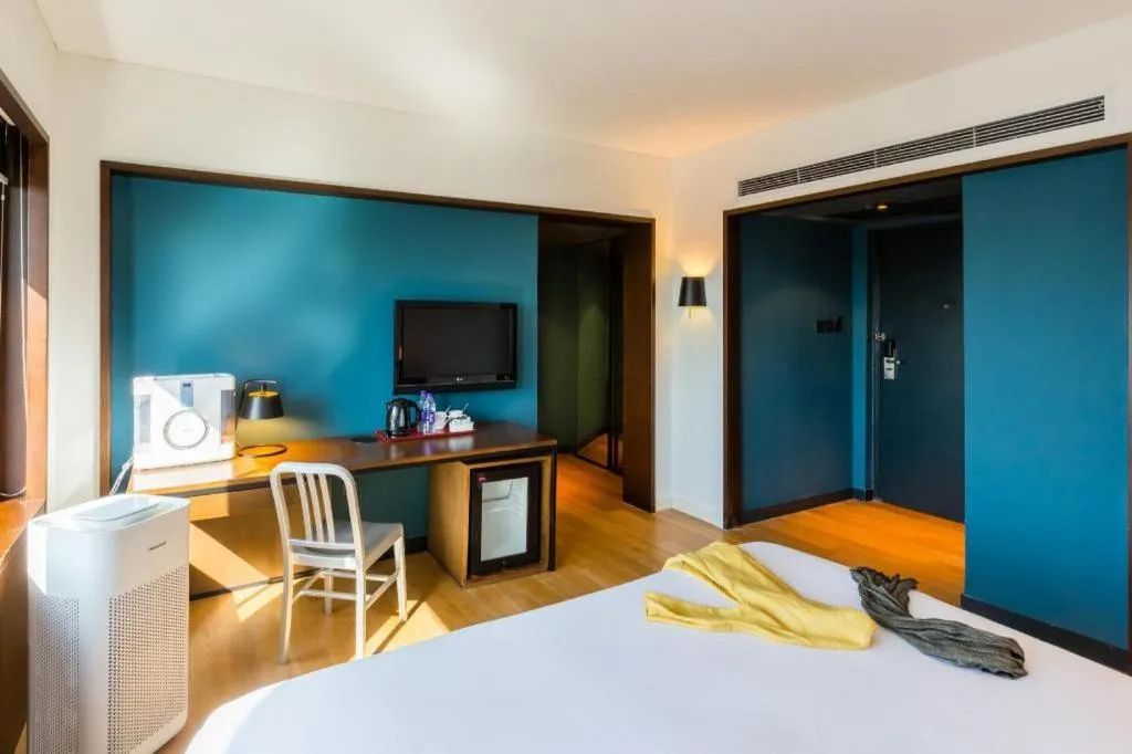 Bed in Beijing New World Center Tongpai Hotel