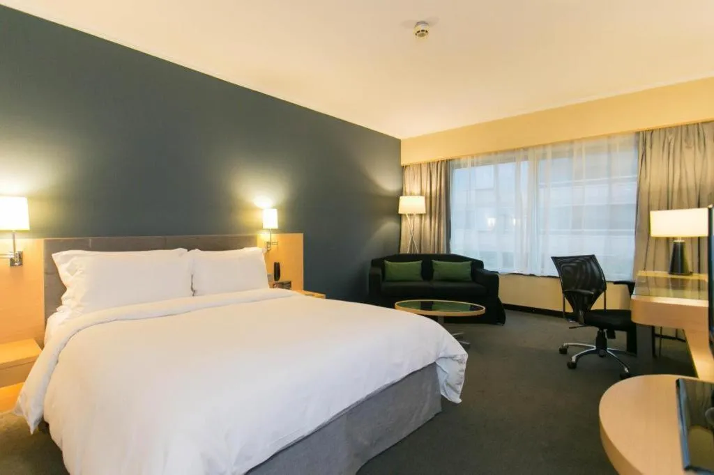 Bed in Beijing New World Center Tongpai Hotel