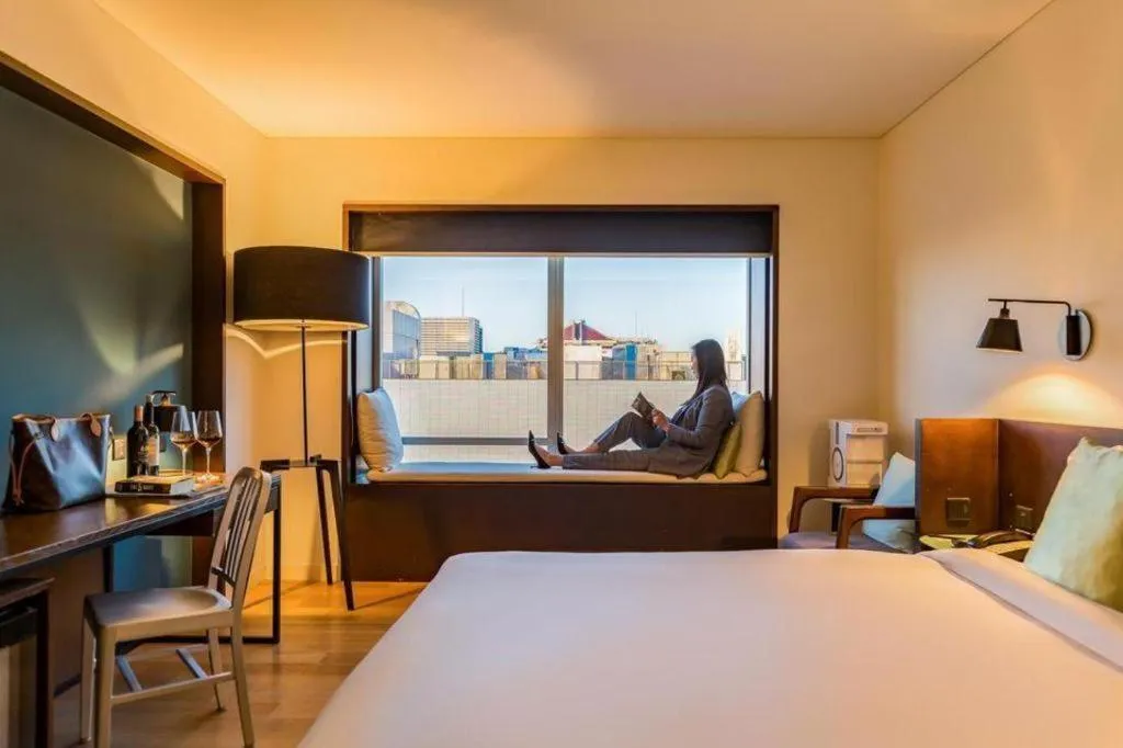 Bed in Beijing New World Center Tongpai Hotel