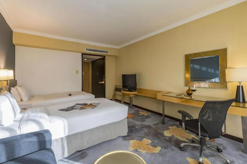 Bed in Beijing New World Center Tongpai Hotel