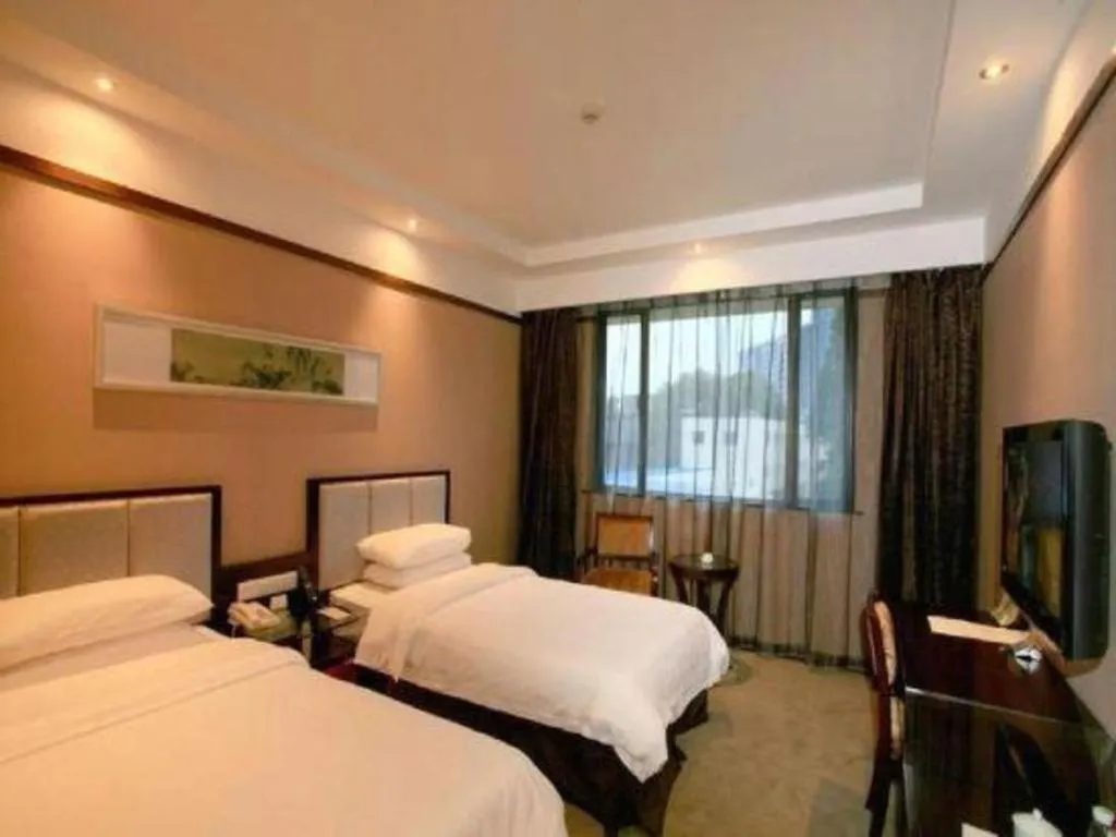 Bed in Jin Jiang Nanjing Hotel