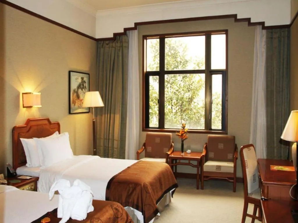 Bed in Jin Jiang Nanjing Hotel