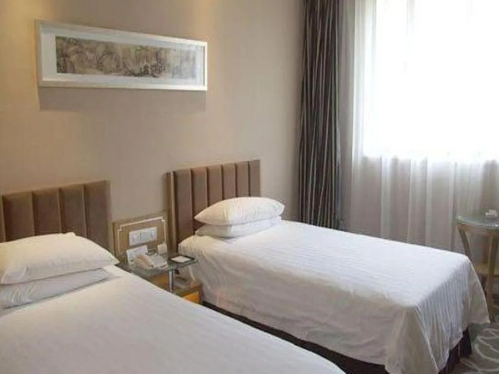 Bed in Jin Jiang Nanjing Hotel