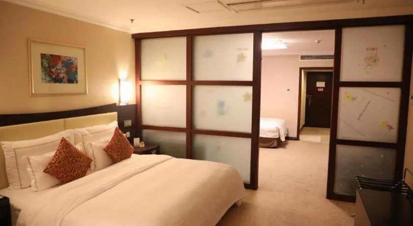 Bed in Beijing Jinjiang Fuyuan Hotel