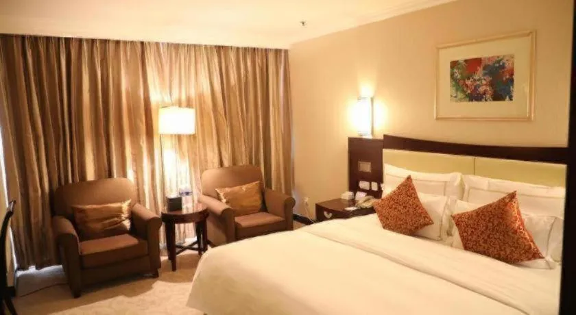 Bed in Beijing Jinjiang Fuyuan Hotel