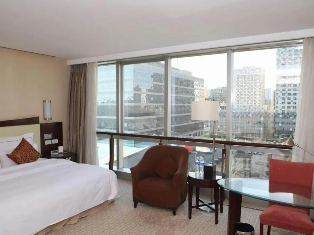 Bed in Beijing Jinjiang Fuyuan Hotel